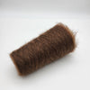 Close-up of CRAFT MIND Super Kid Mohair and Mulberry Silk yarn in 25g bundle, showcasing soft, shiny fibers.