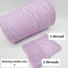Cream-colored CRAFT MIND cotton yarn spool, soft and textured, suitable for knitting and crochet projects.