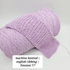Natural cotton yarn skein from CRAFT MIND in soft white, ideal for knitting and crochet projects.