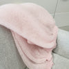 Close-up of CRAFT MIND Super Kid Mohair & Silk yarn in 25g skein, showing soft, shiny fibers in natural light.
