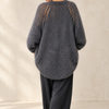 Professional back view of the oversized mohair cardigan
