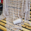 Soft baby alpaca and merino yarn from SIA CRAFT MIND Yarns Italy, showcasing spun fiber in natural cream and light beige tones.