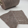 Close-up of SIA CRAFT MIND Yarns Merino Fine Boucle Yarn, showing its textured, soft boucle fiber and rich color.