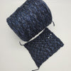 SIA CRAFT MIND Merino yarn with chain twisted texture, soft natural wool in a close-up view, from Italy.