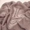 Light pink Stock Igea Super Kid Mohair yarn in 25g skein, soft and fluffy with a smooth texture.