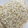 Yarns from Italy 100% cotton yarn with subtle gold lurex fibers, showcasing soft, shiny textile for knitting or craft projects.
